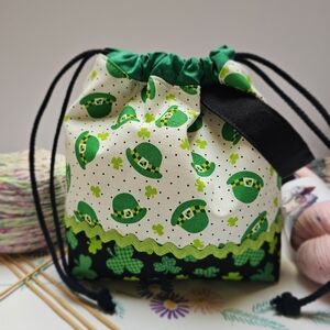 Green and White Drawstring Bag with Shamrock Design